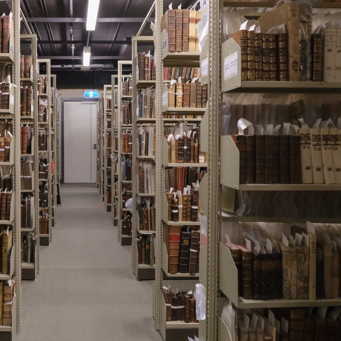 Rows of shelves neatly lined with books