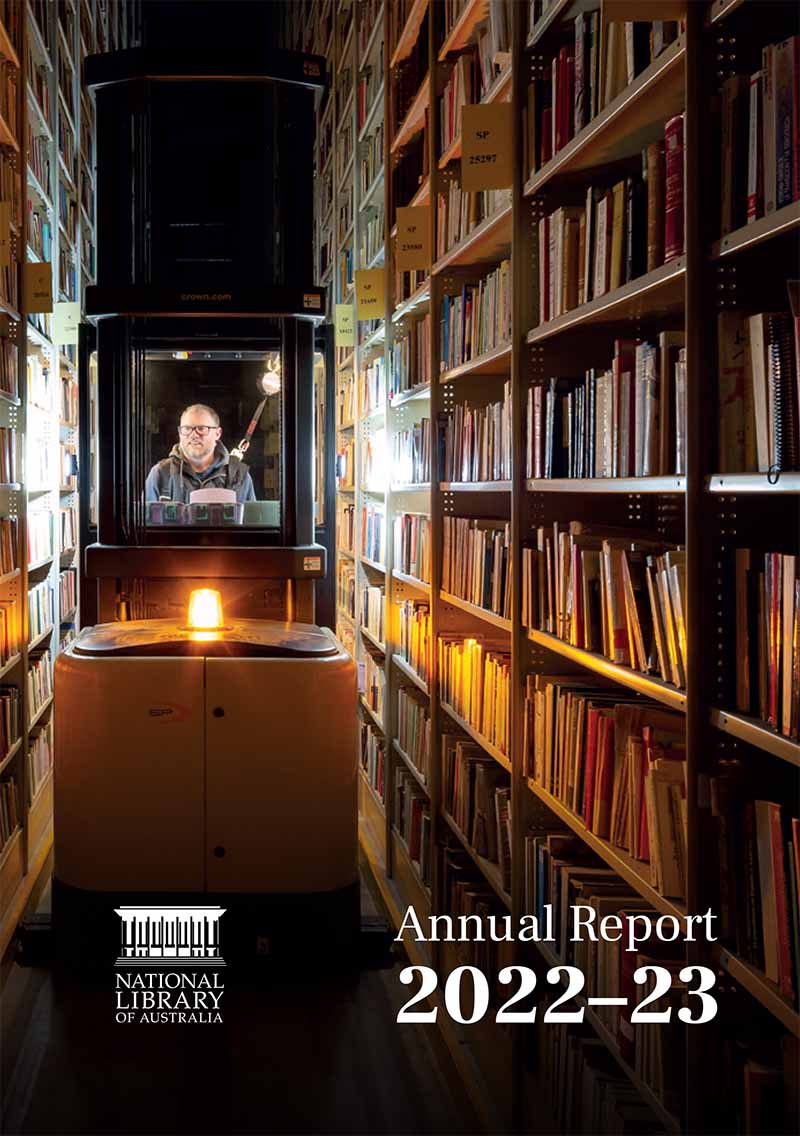 National Library of Australian Annual Report cover showing man driving machine between stacks of books