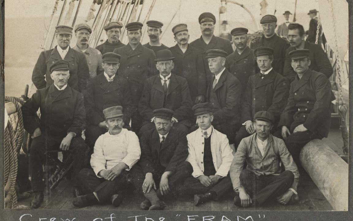 Black and white image of a group of uniformed men who make up the crew of the 'Fram' ship in 1912