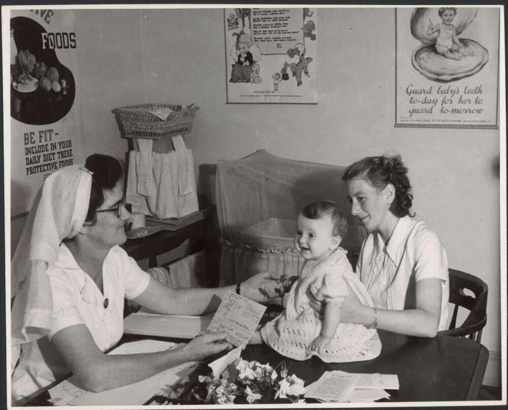 Mother and baby attending the Drouin Infant Welfare Centre, Victoria, 1944.jpg