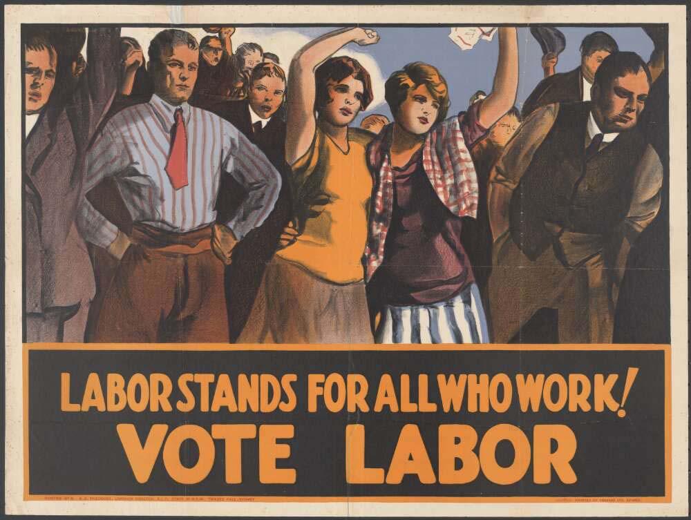 A group of workers, both men and women, stand together. Two women stand in the centre with raised fists, one wears a plaid shirt and a striped skirt. The group is surrounded by men, some with hands on hips, and others with arms raised. The text at the bottom of the poster reads: "LABOR STANDS FOR ALL WHO WORK! VOTE LABOR." The poster uses shades of orange, red, and brown, with bold and expressive lines.