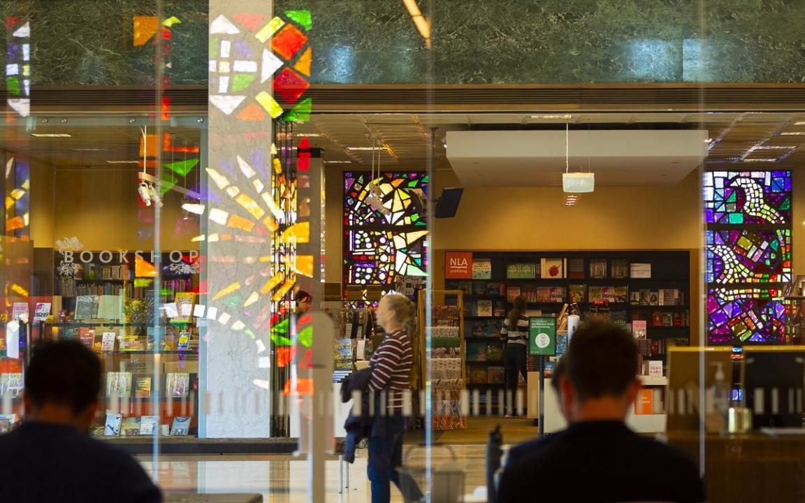 The front of the National Library Bookshop including passing visitors