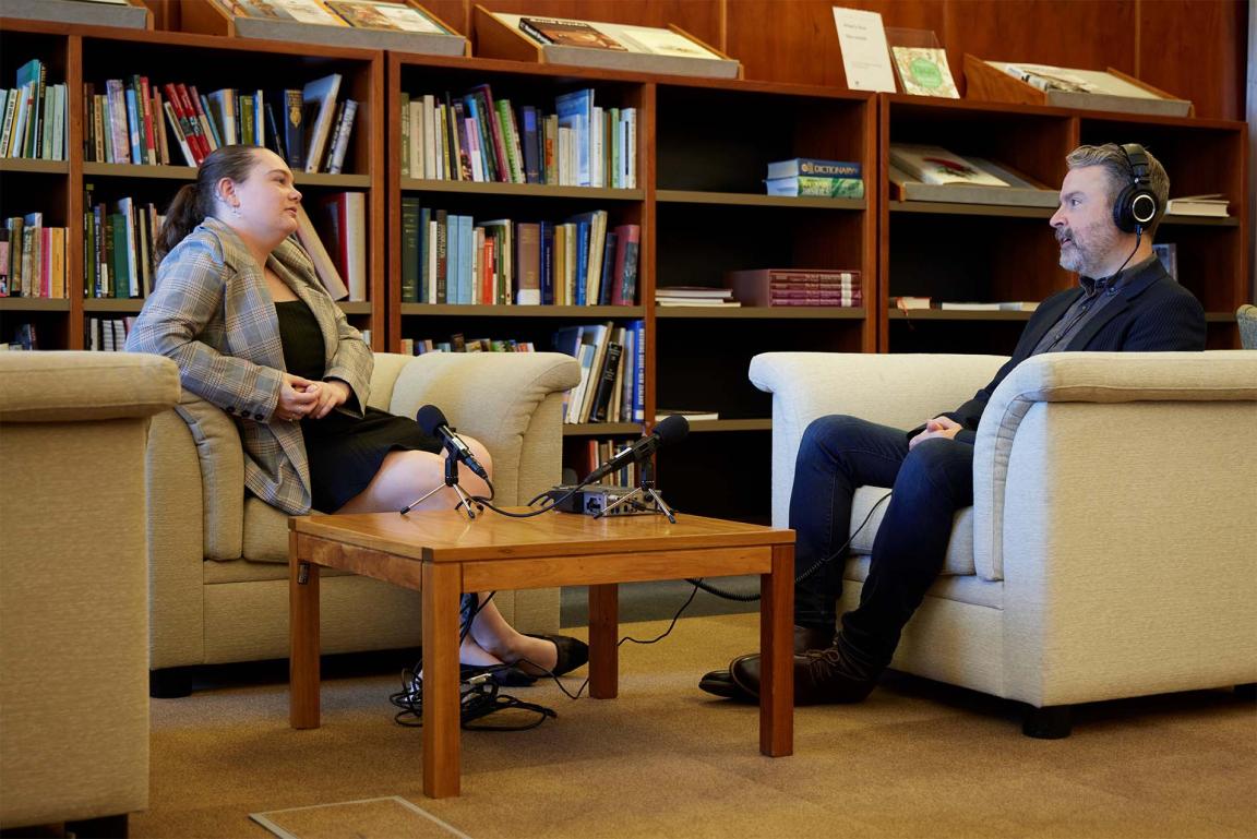 A National Library oral historian conducting an interview with a young woman