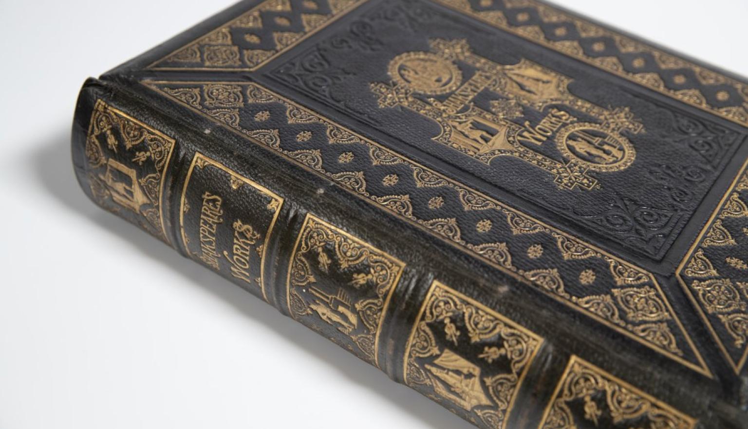 Large black and gold book