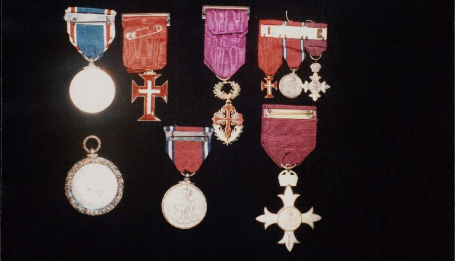 Nine medals awarded to J.P. and J.M. Braga, including an OBE awarded to J.P. Braga